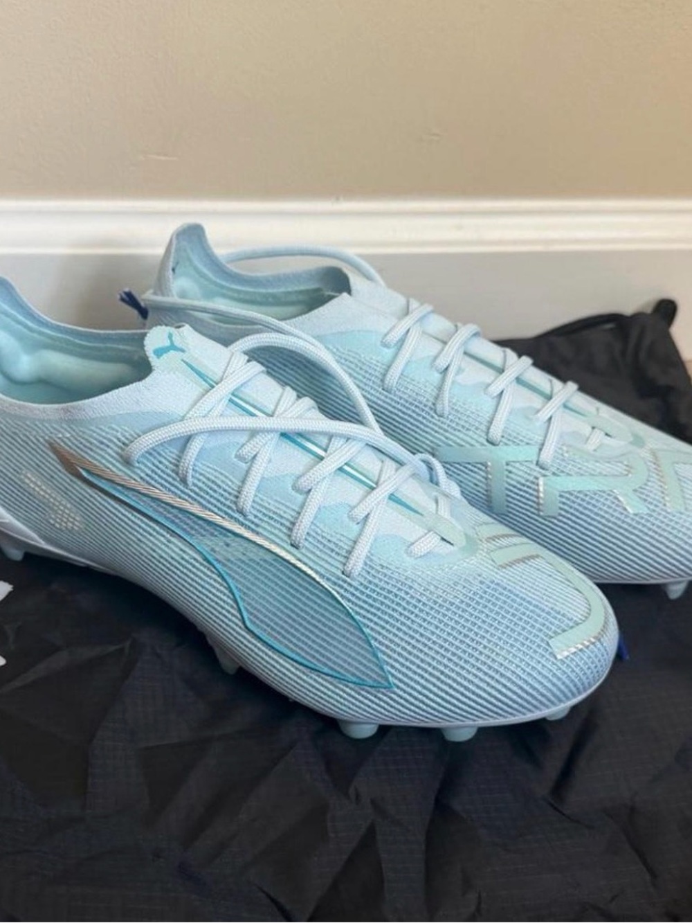 Puma Women's Light Blue Soccer Cleats with Silver Accents